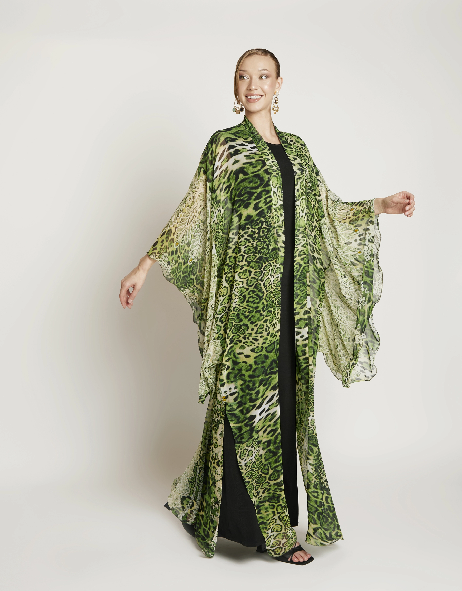 Secret Garden kimono front view Secret Garden kimono front view with delicate drape, soft layered silhouette, and graceful flow
