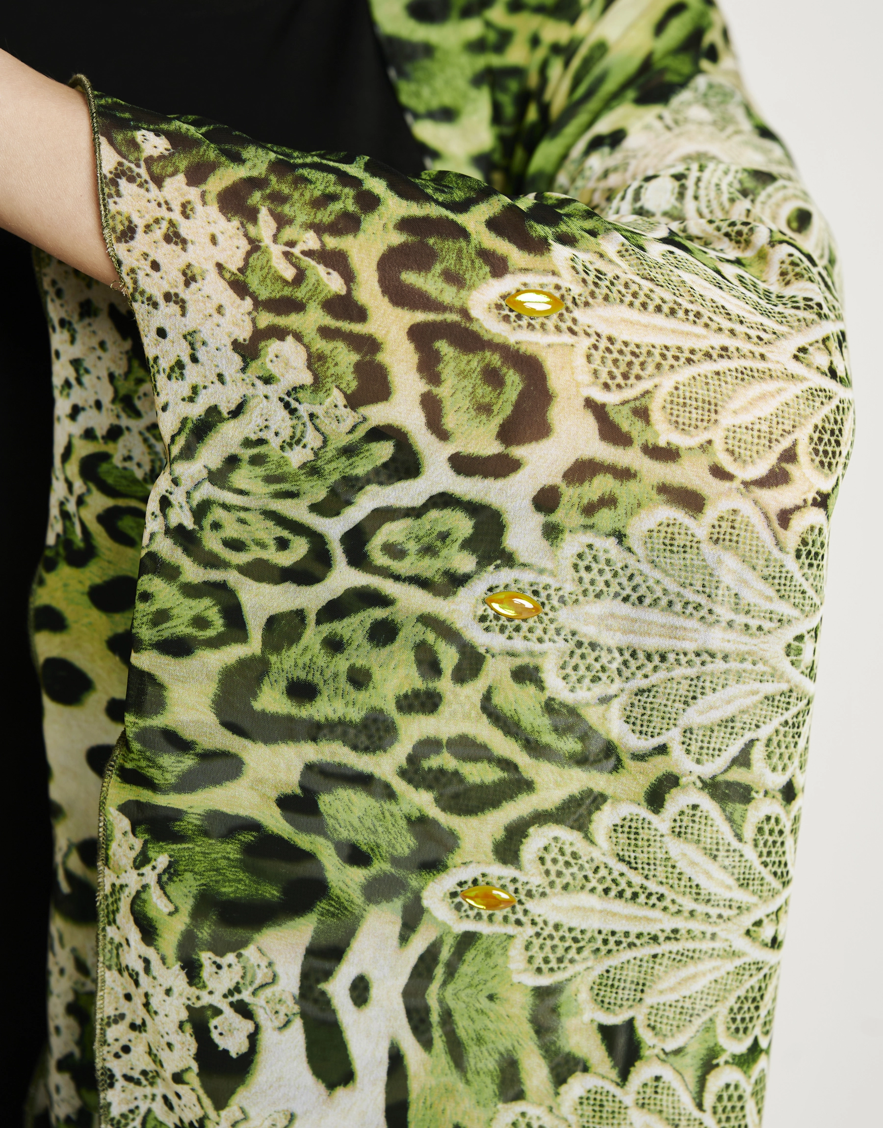 Secret Garden kimono detail view Close-up of fabric and drape detail on Secret Garden kimono showing delicate airy layers and subtle texture