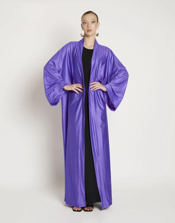 Soft Rebellion kimono front view with clean drape, elegant sleeves, and subtle confident movement